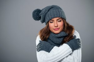 woman-shivering-in-winter